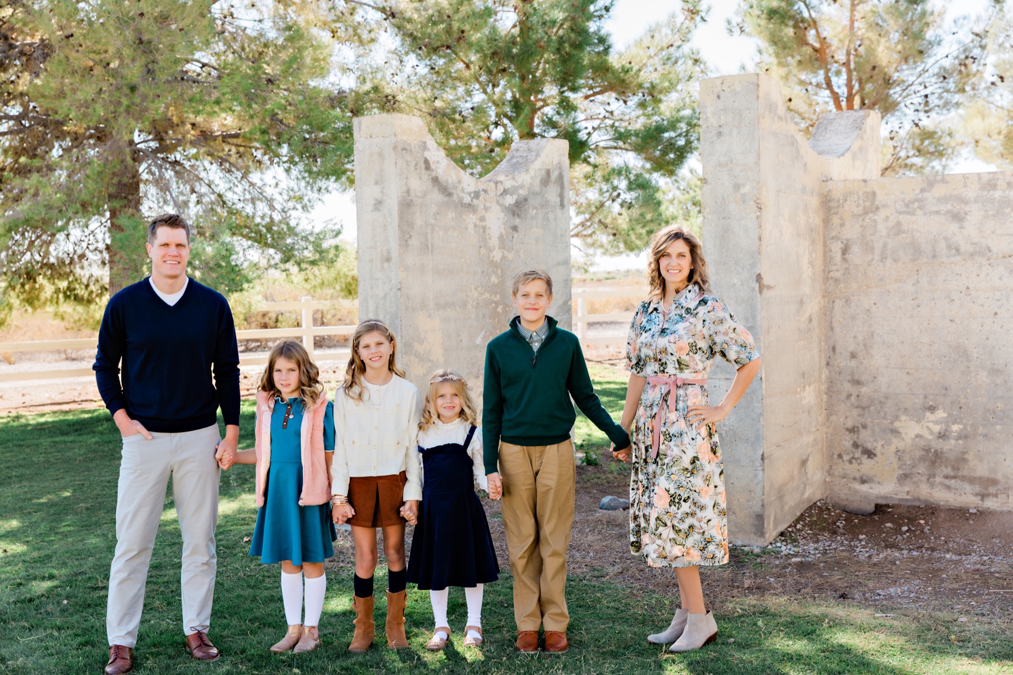 Family with young children in garden setting